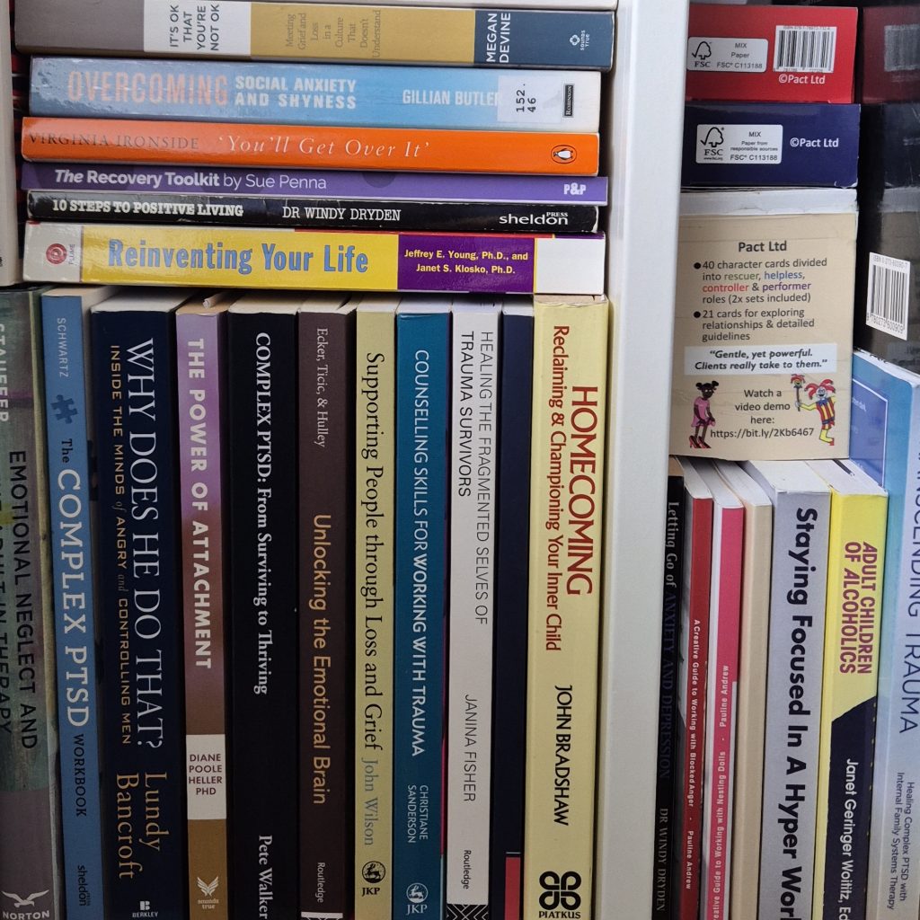 Stack of books in bookshelf